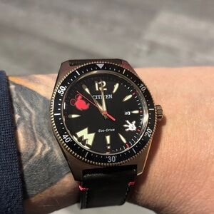 Citizen Men's Black and Gold Eco-Drive Watch